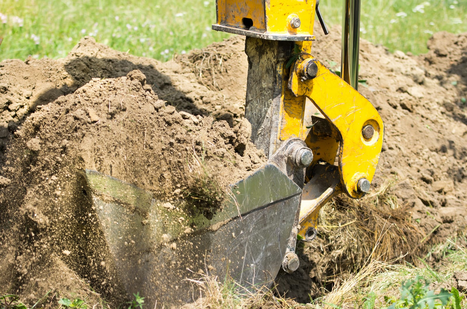 Backhoe bucket digging