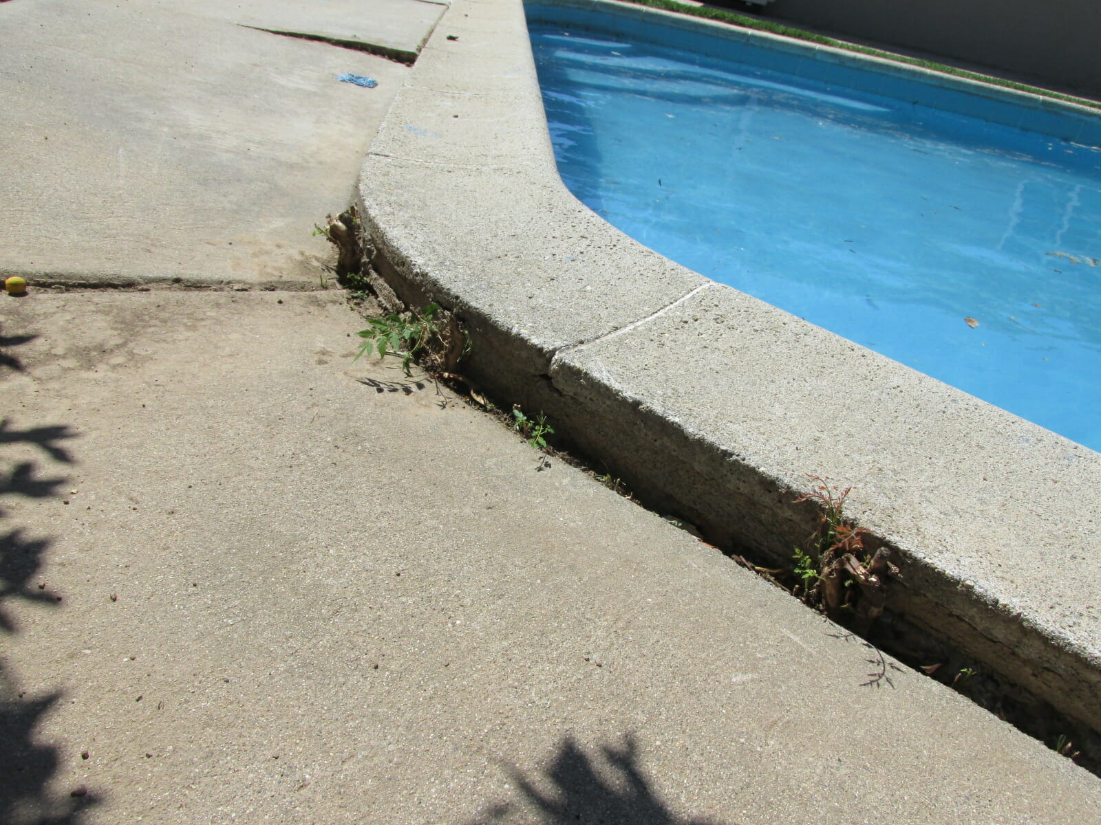 Concrete pool deck has dropped down 3 inches