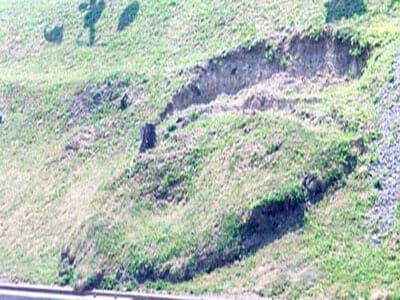 Slope creep scarp evidenced by soil movement
