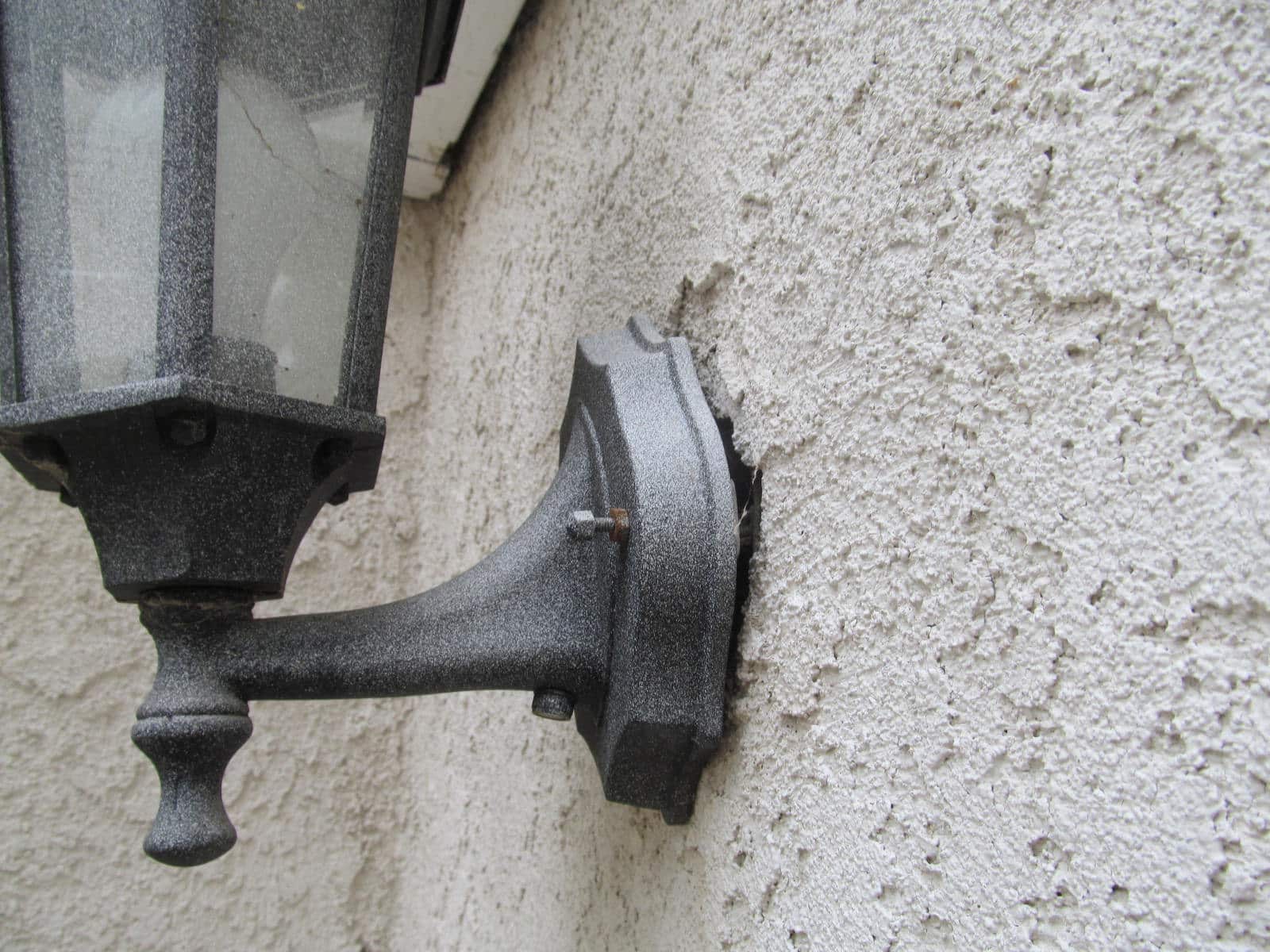 Exterior Light Not Caulked or Sealed At Wall