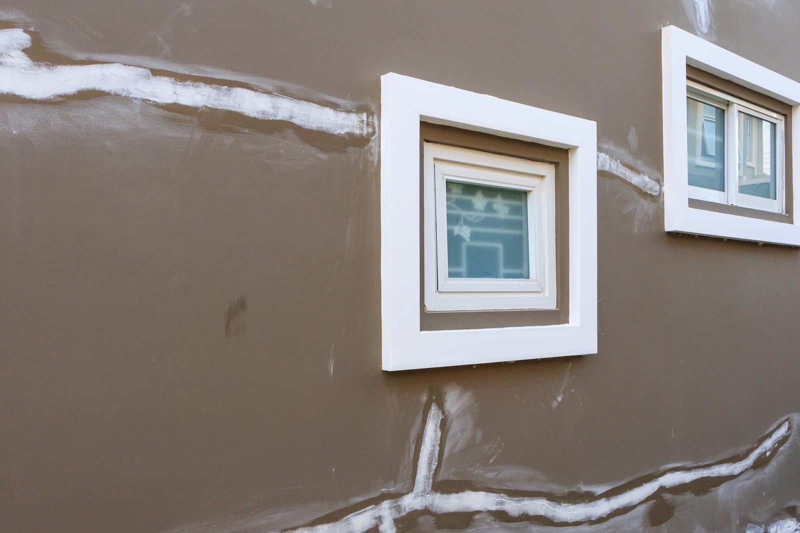 Stucco Cracks at Door and Window Corners | which ones are serious