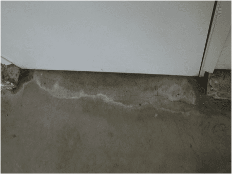 Water running or draining into the garage